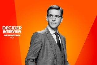 Brian Dietzen in black and white on a bright orange background