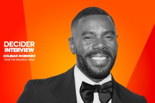 Colman Domingo in black and white on a bright orange background