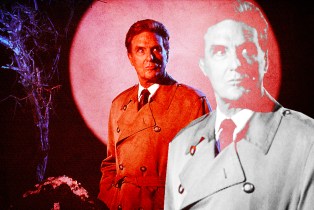 Robert Stack in front of a scary spooky set piece